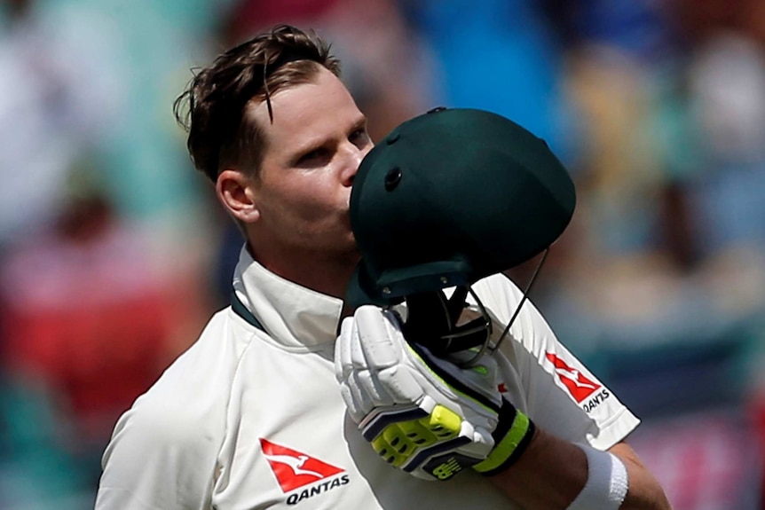 Australia's captain Steven Smith celebrates his century on day one of the fourth Test against India.