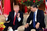 US President Donald Trump interacts with Chinese President Xi Jinping at Mar-a-Lago state in Palm Beach, Florida.