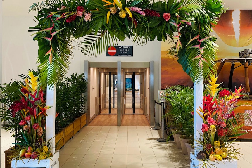 Archway floral display at Cairns Airport to interstate visitors for December 1, 2020.