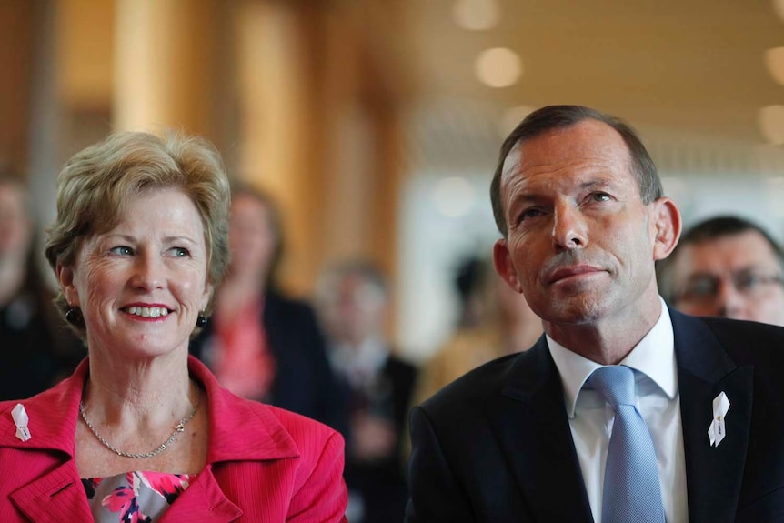 Christine Milne sits next to Tony Abbott