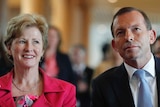Christine Milne sits next to Tony Abbott