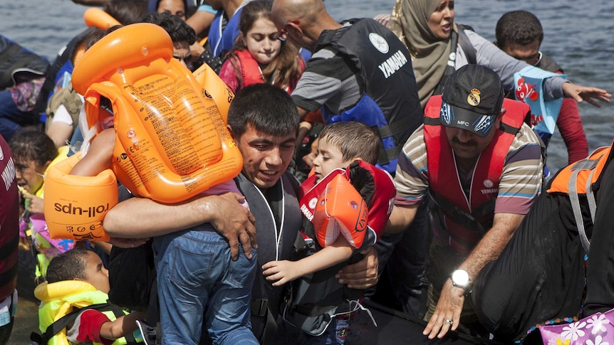 Syrian refugees arrive on the Greek island of Lesbos