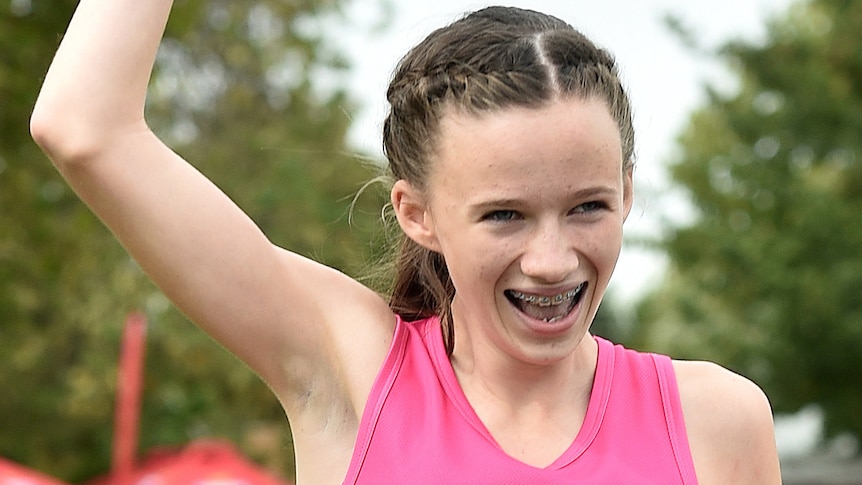 Talia Martin reacts after winning the women's Stawell Gift