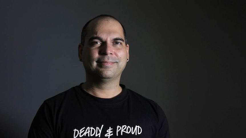 Ben Graetz wears a black tee with white text that read "deadly and proud". 