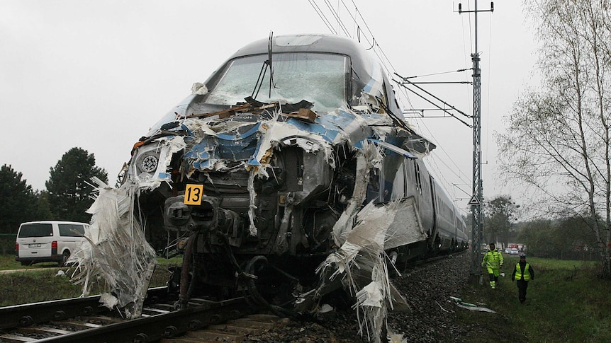 The damaged nose of a Pendolino fast train that hit a flat-bed truck at an unguarded railway crossing.