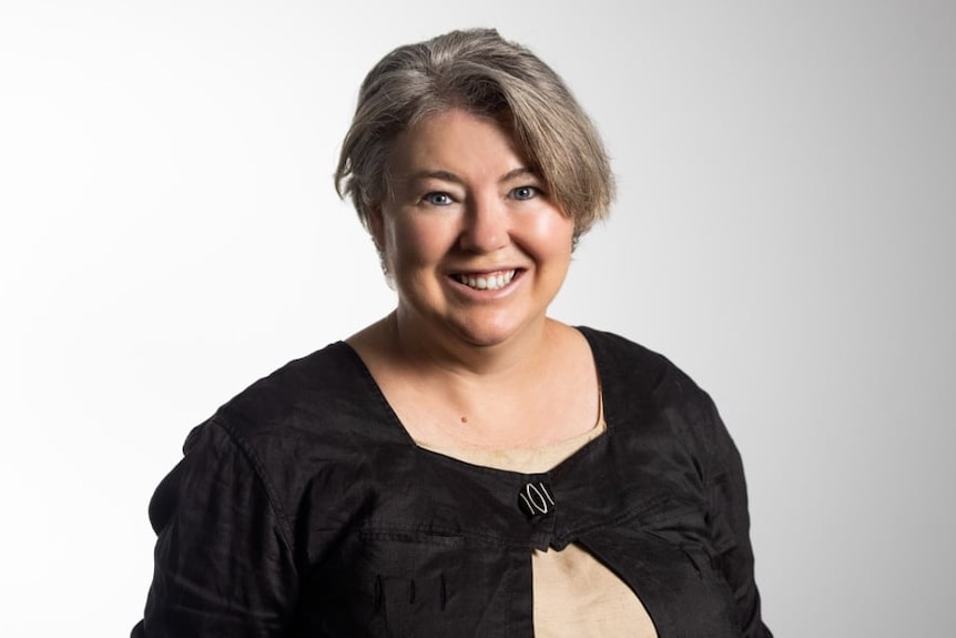 Headshot of Griffith University Professor Susan Harris Rimmer smiling.