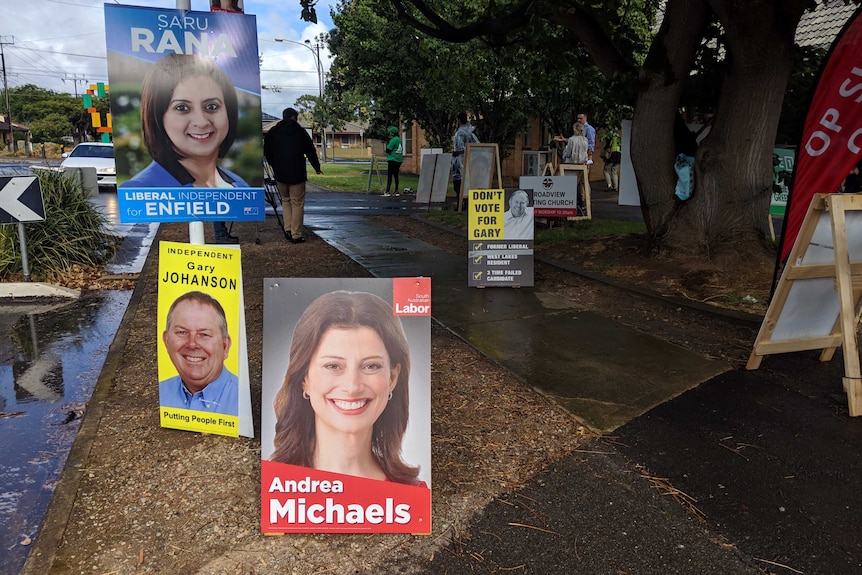 Posters outside a polling station for the Enfield by-election.