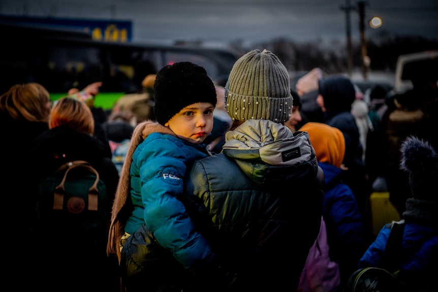 Crowds of people at the Medyka border crossing