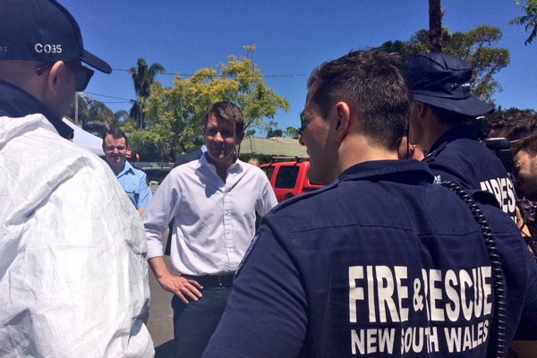 NSW Premier Mike Baird meets emergency workers after a tornado severely damaged at least 25 homes in Kurnell December 16 2015