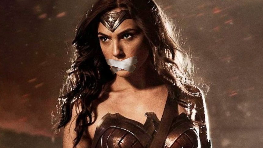 Wonder Woman with tape over her mouth.