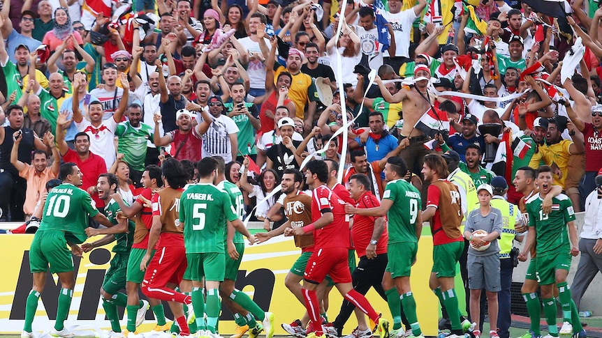 Iraq celebrate a goal during the quarter final of the Asian Cup.