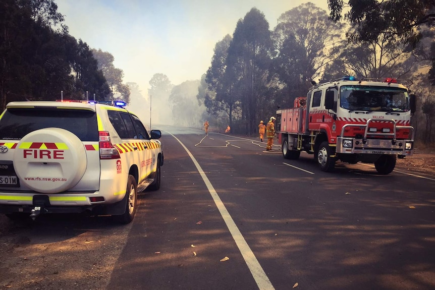 Fire crews on the edge of fire in Sydney's west, in between Llandilo and Londonderry.