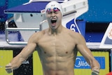 Sun Yang screams and clenches his fist having won the 400m freestyle final.