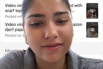 An indian woman with a screenshot behind her. 
