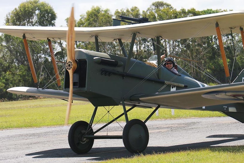 Andrew Carter lands a replica WWI plane.