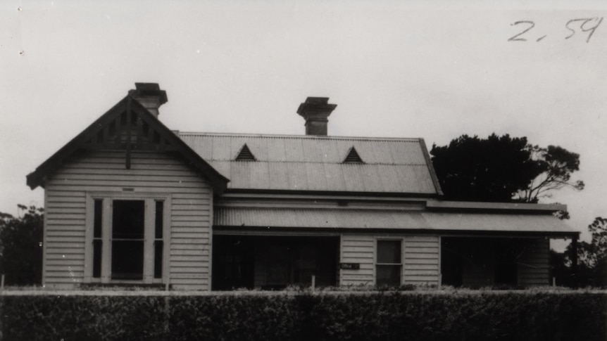 A black and white photo of a former police station from the 1930s.