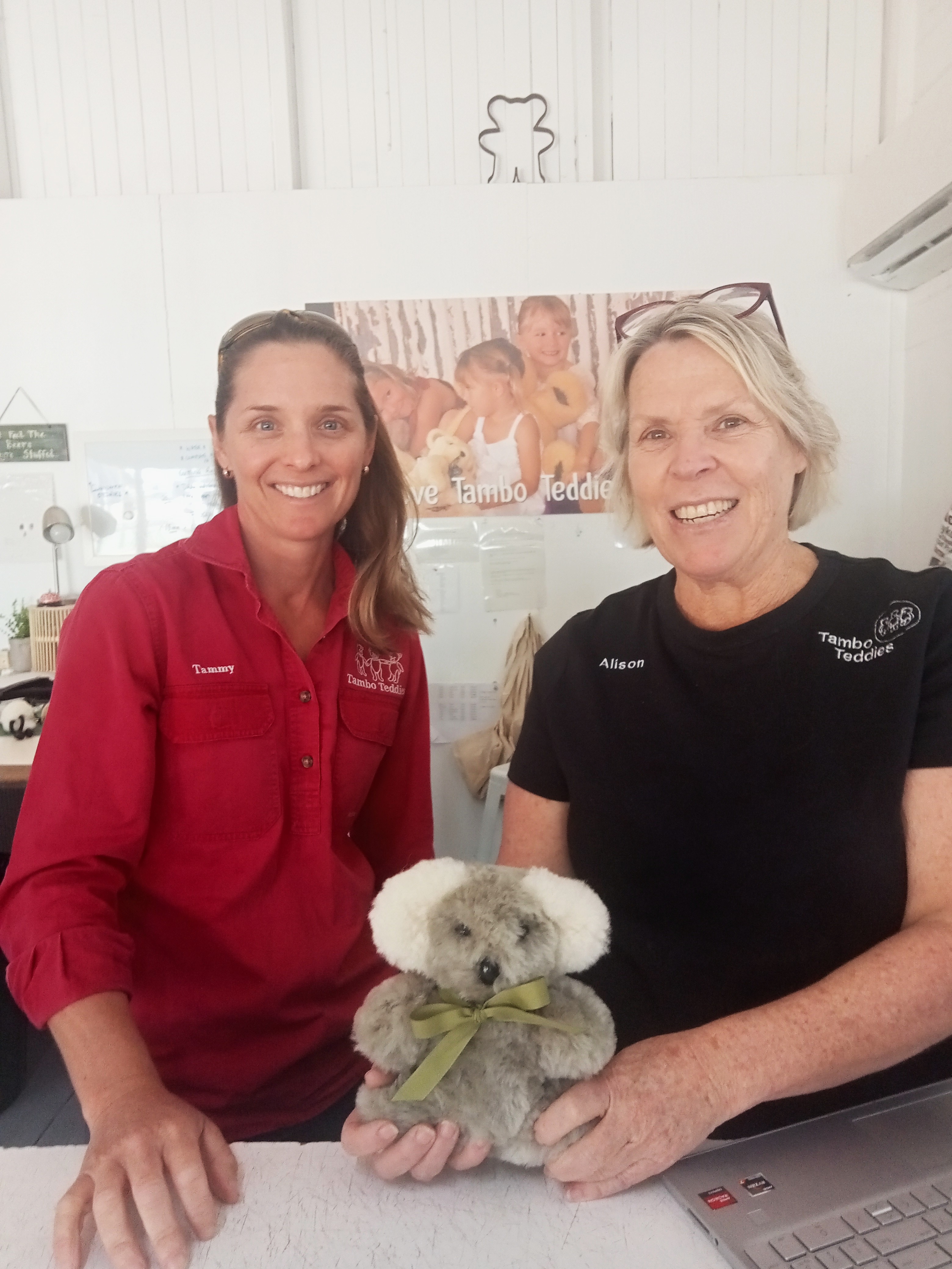 TWo women with a toy koala.