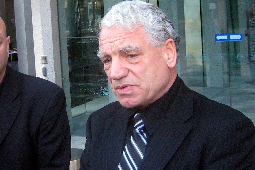 Frederick Tobin talks to reporters in June 2011.