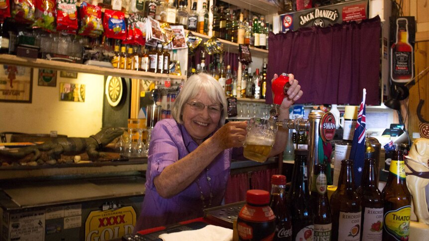 Margaret Pusey pulls a pint at the Grand Hotel in Kookynie.