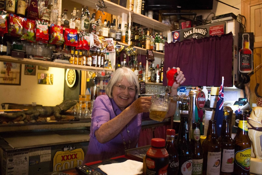 Margaret Pusey pulls a pint at the Grand Hotel in Kookynie.