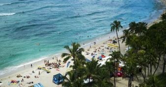 An aerial shot of people on the beach.