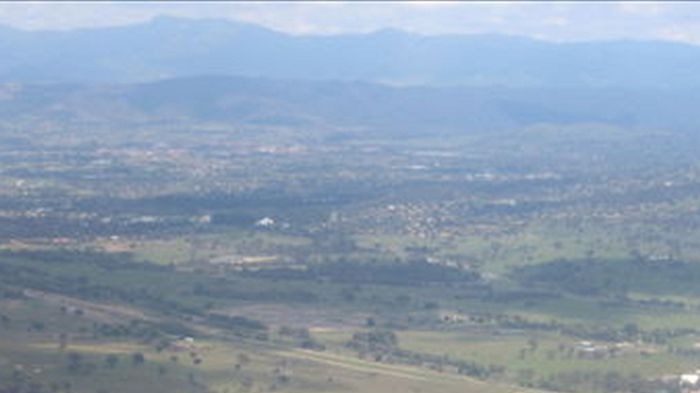 The Village Building Company wants to construct a housing estate at Tralee but has faced opposition from the Canberra Airport because of aircraft noise concerns.
