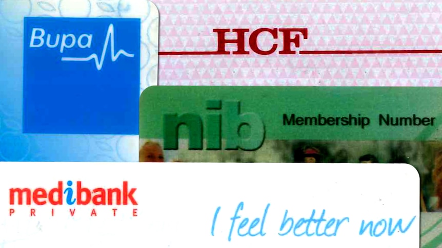 不同颜色的塑料卡片，上面印有不同保险公司的英文名字。