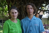 Tracey Farrar is wearing a green shirt and looks serious. Her son Bradley wears a Good Shepherd Lutheran College uniform.