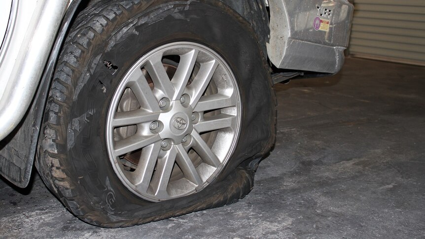 A flat tyre of a stolen car
