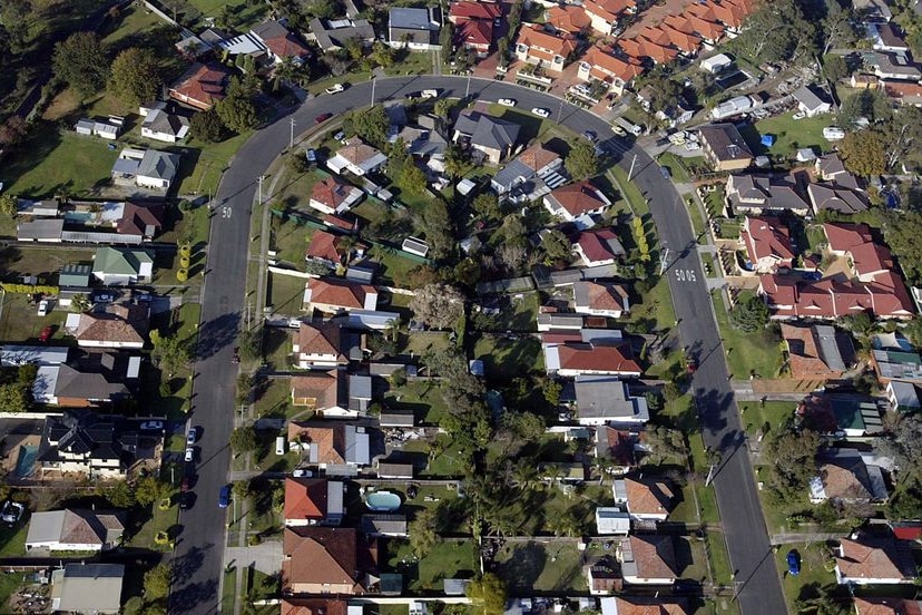 An aerial view of houses on a suburban Sydney street.