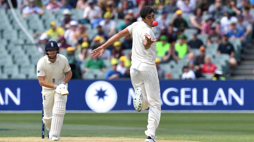 Mitchell Starc juggles a caught and bowled to dismiss England batsman Jonny Bairstow.