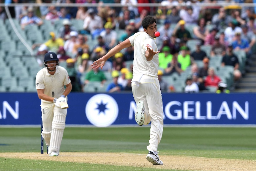 Mitchell Starc juggles a caught and bowled to dismiss England batsman Jonny Bairstow.