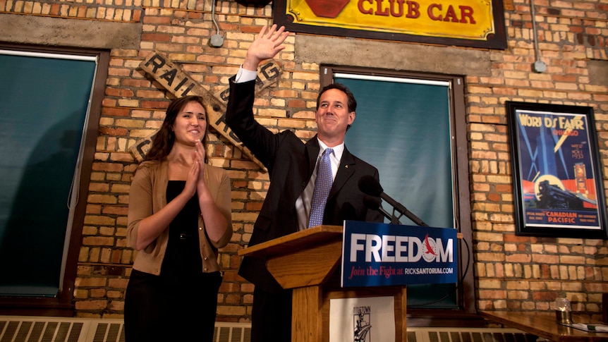 Santorum and his daughter in Wisconsin