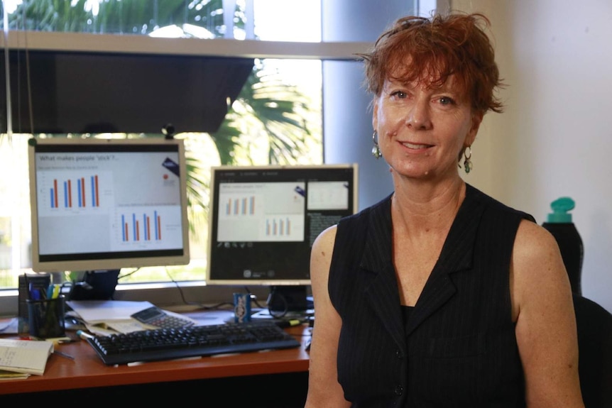 A photo of CDU researcher Fiona Shelley sitting at her desk.