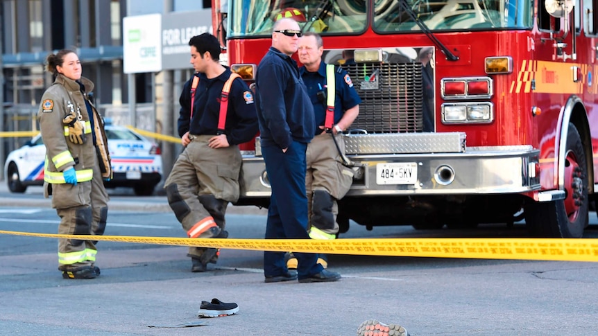 An eyewitness described seeing people's belongings strewn along the road after the incident.