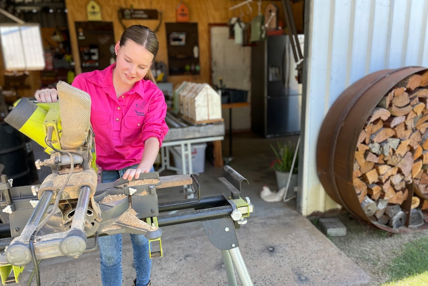 Photo of a young girl using a grinder.