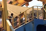 At sea: Asylum seekers wait on the Oceanic Viking.