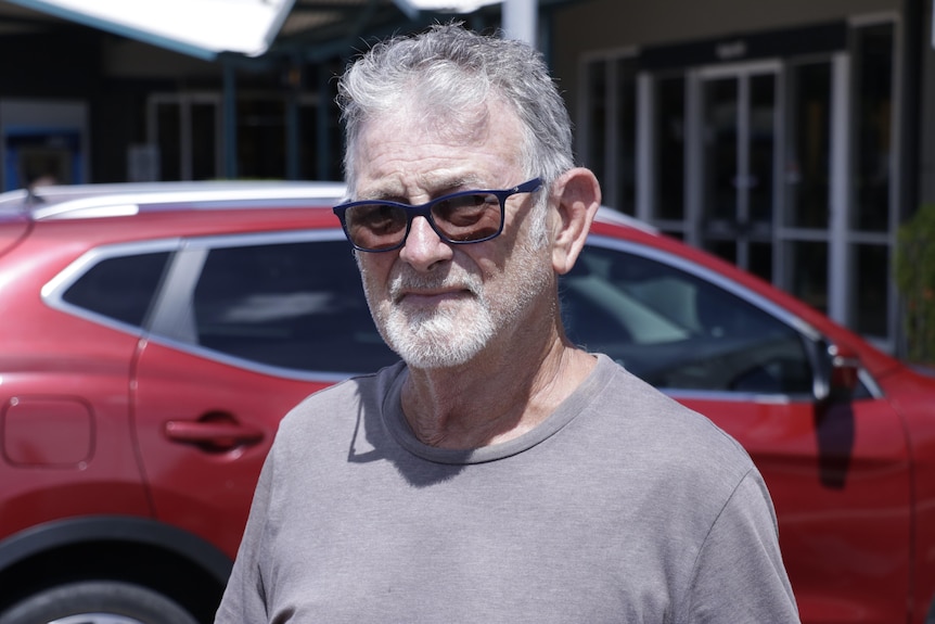 Rapid Creek resident Peter Stretton stands in the car park of a Darwin shopping centre.