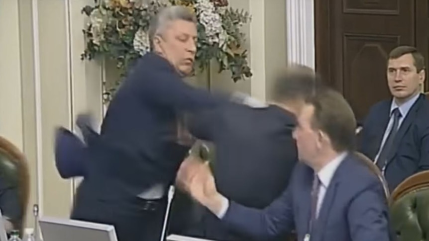 Two Ukrainian lawmakers exchanged punches.