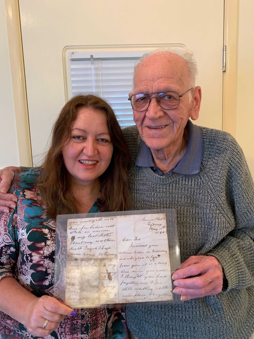 Karen Roberts and her father Rex Nightingale with the letter.