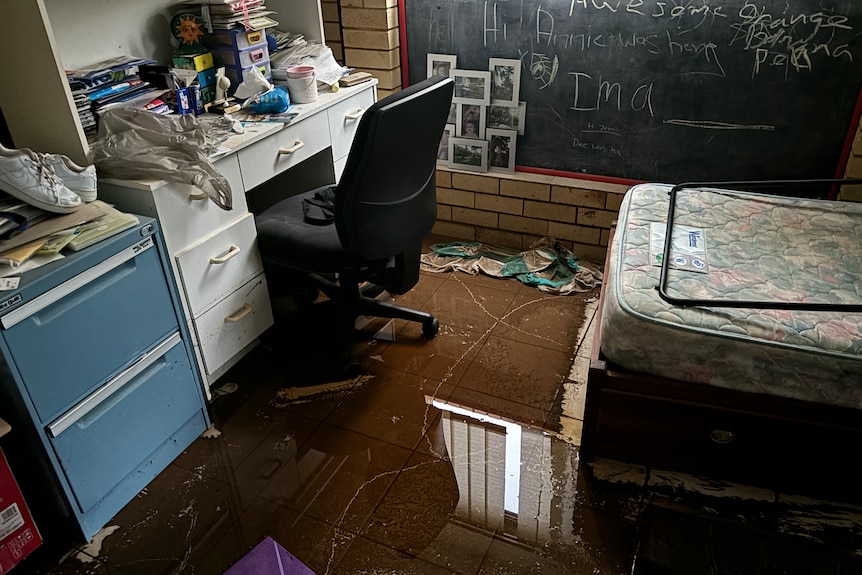 Furniture sits in floodwaters
