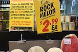 Signs in an independent supermarket saying "these rockmelons are safe, they are not from NSW".