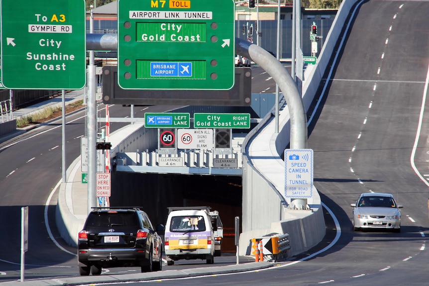 Vehicles enter the Airport Link tunnel at Stafford Road, Kedron.