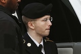 US soldier Bradley Manning is escorted into court