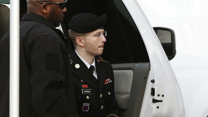 US soldier Bradley Manning is escorted into court