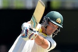 Australia's Mitchell Starc goes after the Indian bowling on day three at the Gabba.