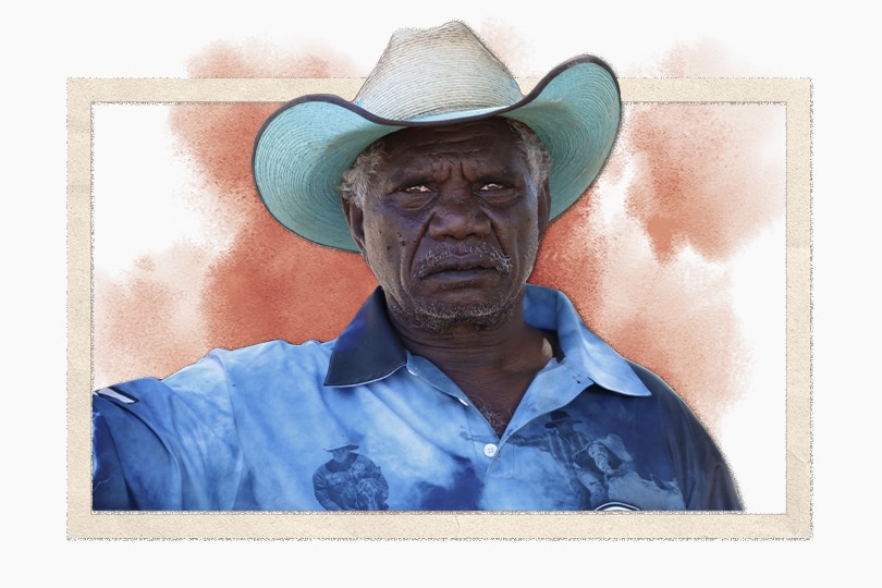 an aboriginal man wearing a blue fishing shirt