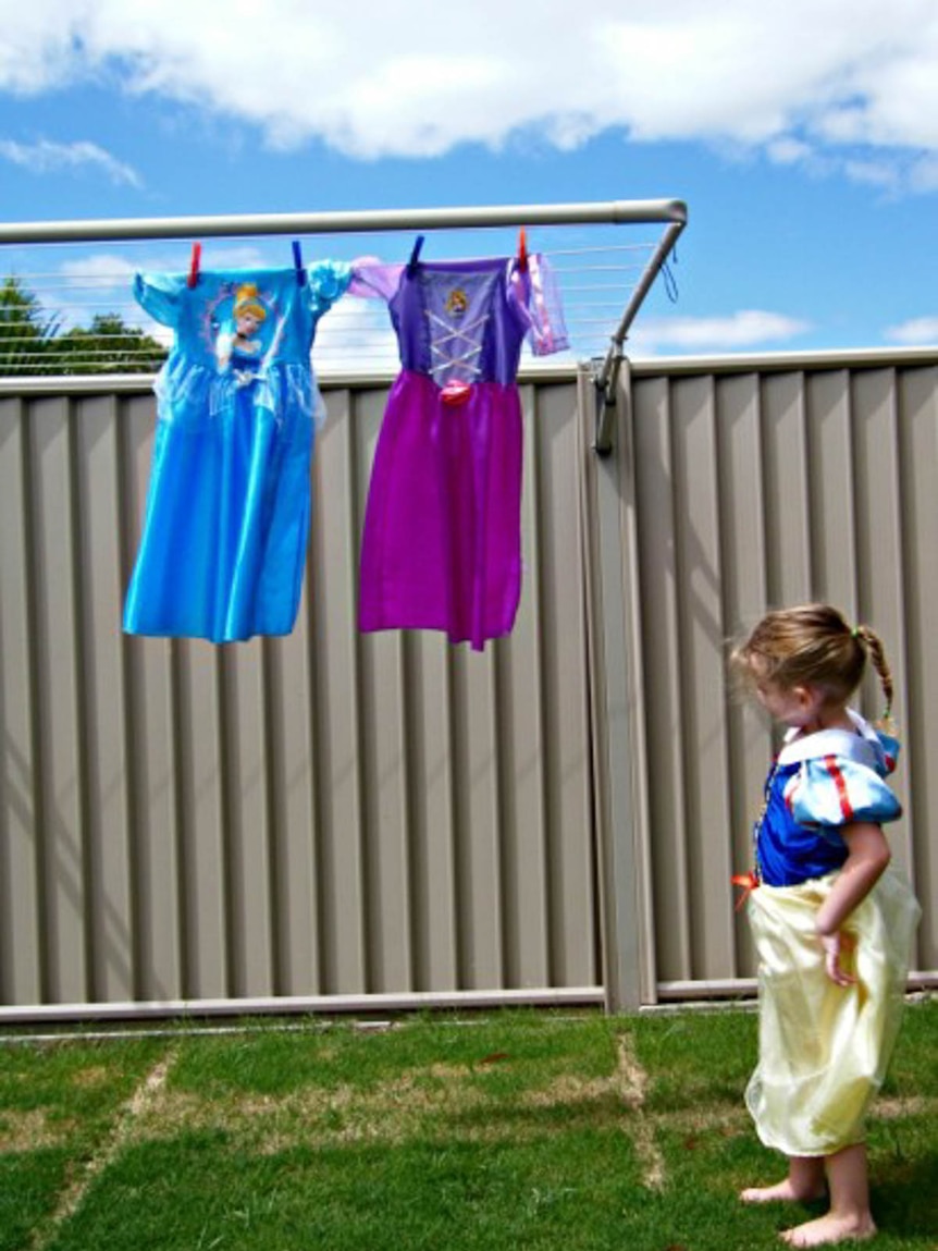 Renee Wilson's daughter dressed in Snow White costume, representing traditional gender expectations for girls.