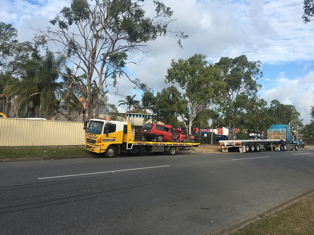 Car being towed at Wacol