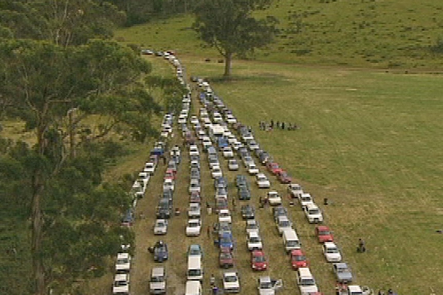 Cars line up to enter the Falls music festival at Marion Bay, Tasmania